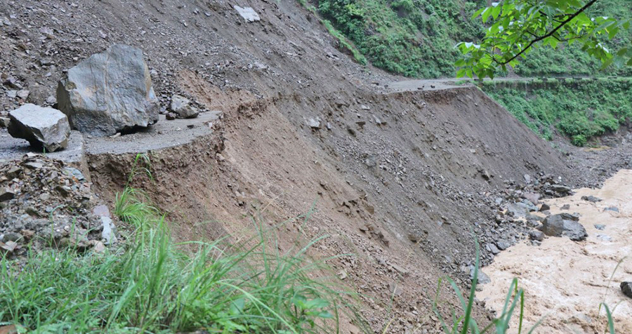 Landslides, floods block almost three dozen of road sections across country