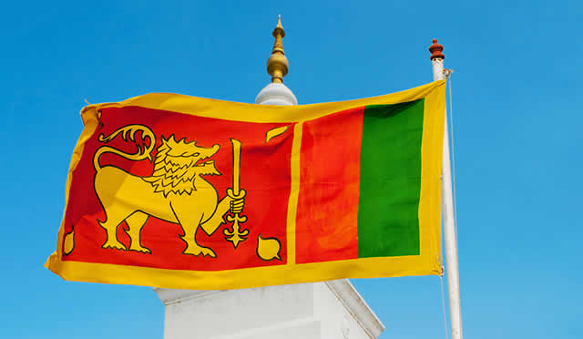 Sri Lanka warns it will default on its foreign debt amid crisis