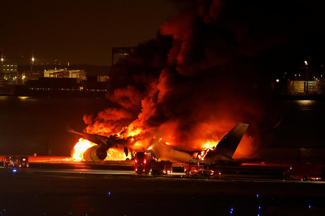 Passengers escape blaze on Japan Airlines plane after collision at Tokyo airport